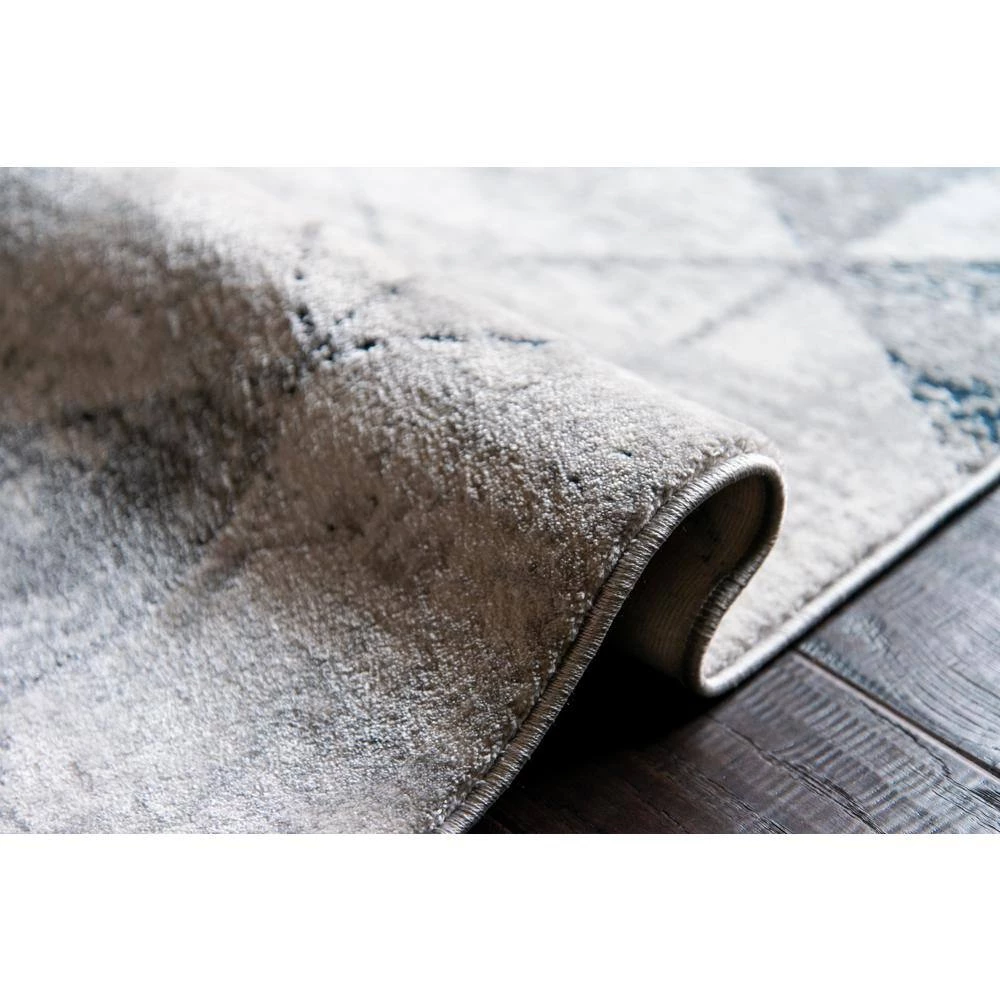 Madrid Marbella Denim Blue 7 ft. 10 in. x 10 ft. 6 in. Area Rug by United Weavers 11 Madrid Marbella Denim Blue 7 ft. 10 in. x 10 ft. 6 in. Area Rug by United Weavers - Image 9