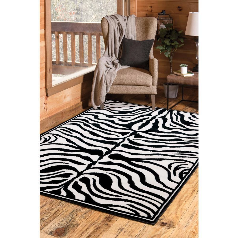 Zebra Skin White/Black 5 ft. x 7 ft. Area Rug by United Weavers 4 Zebra Skin White/Black 5 ft. x 7 ft. Area Rug by United Weavers - Image 2