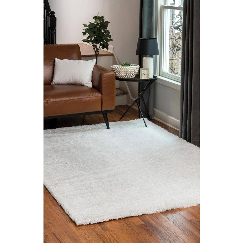 Ritz Easton White 5 ft. 3 in. x 7 ft. 2 in. Area Rug by United Weavers 4 Ritz Easton White 5 ft. 3 in. x 7 ft. 2 in. Area Rug by United Weavers - Image 2